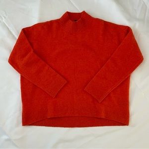 orange uniqlo mockneck sweater